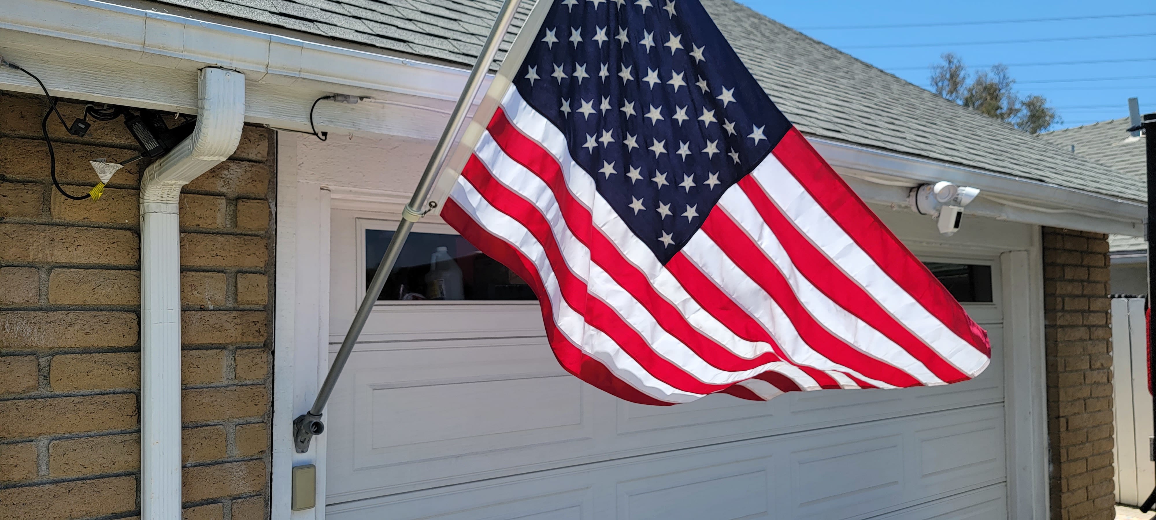 How to Mount a Flagpole on Your House
